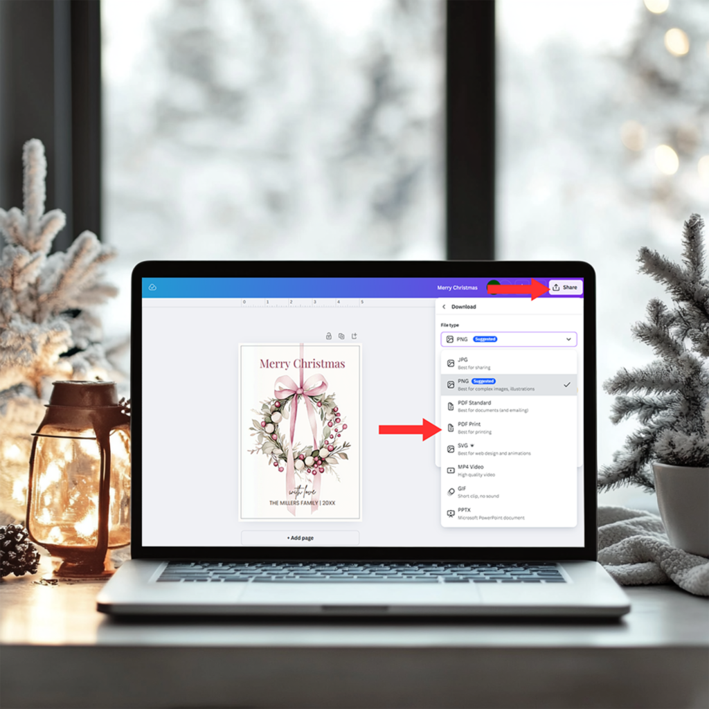 A laptop displaying Canva's editing interface with a holiday-themed design in progress. The 'Elements' tab shows festive options like bows, snowflakes, and pine branches. Surrounding the workspace are festive decorations, including a small Christmas tree, glowing string lights, and pastel ornaments, enhancing the creative mood.