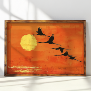 Japandi Crane Wall Art featuring silhouetted birds flying across a vivid orange sky, with a textured yellow sun in the background.