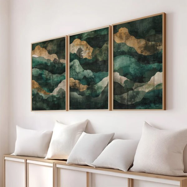 A three-panel Wabi Sabi Triptych Wall Art set in earthy green, brown, and gold tones hangs above a minimalist bench with white cushions, creating a tranquil and balanced atmosphere