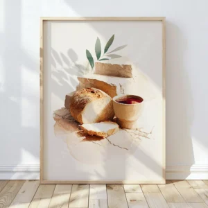 Framed Christian Communion Wall Art showing a loaf of bread, a ceramic cup of red wine, and green leaves on a cracked stone ledge. Soft shadows enhance the peaceful mood.