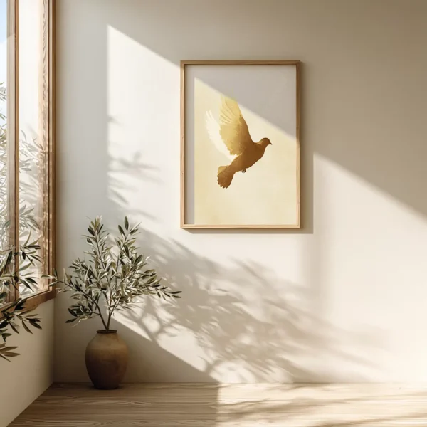 Framed Christian Dove Wall Art on a sunlit wall with soft shadows. A potted plant nearby adds greenery to the peaceful minimalist space.