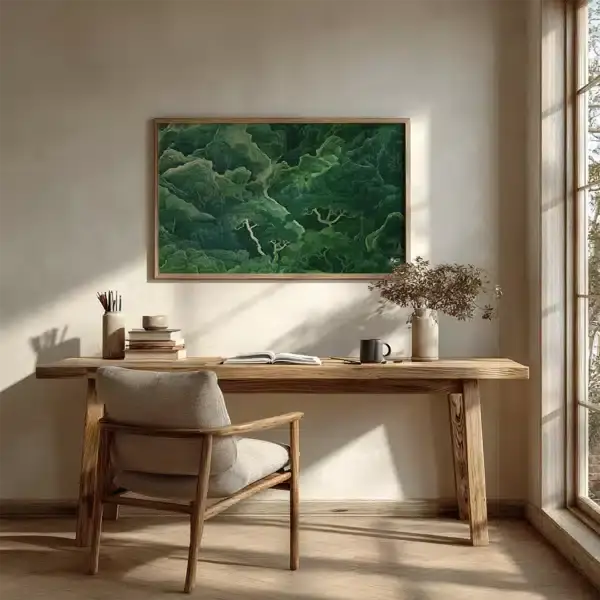 A cozy room with a wooden desk and chair near a sunlit window. Above hangs a Sage Green Horizontal Wall Art, adding a peaceful forest element.
