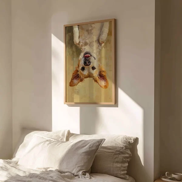 A warm, sunlit bedroom with white pillows and sheets. Above the bed hangs a Golden Retriever Dog Wall Art of an upside-down dog with perked ears.
