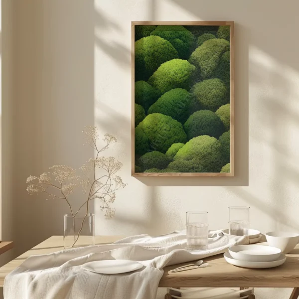 Serene dining setup with wood table, white dishware, and neutral cloth. A framed Japanese Green Wall Art brings freshness to the wall.